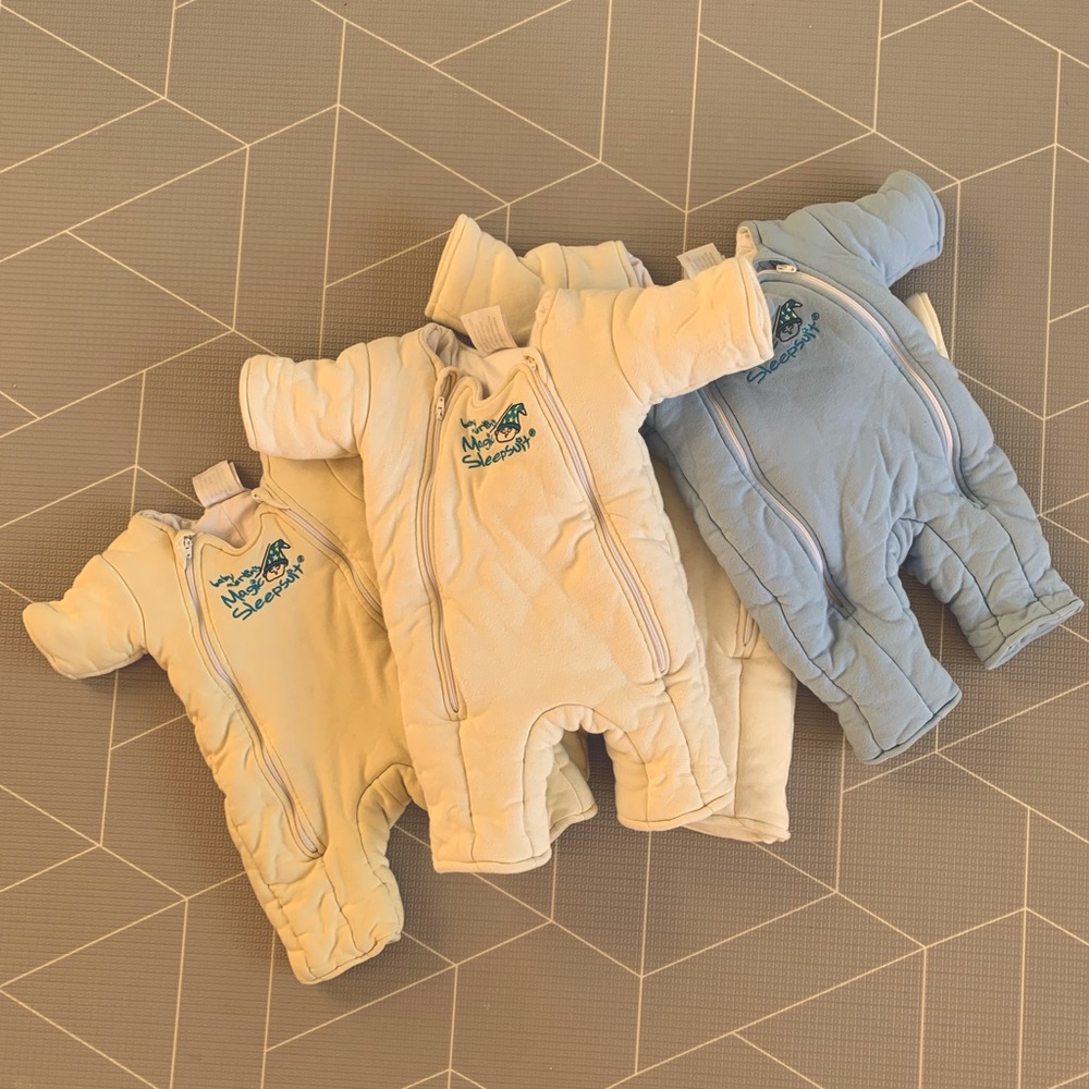 Four Merlin Magic Sleep Suits in Great Condition! Size Small (3-6 Months)